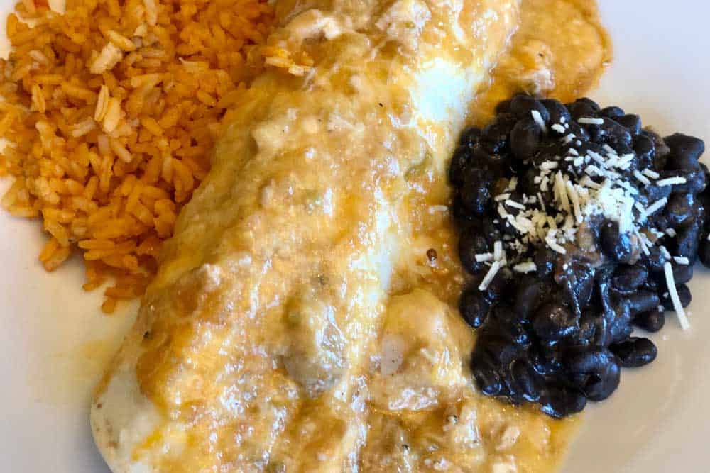 chicken-or-carnita-burritos chicken enchilada with rice and beans divine dinnerz epic egg restaurants